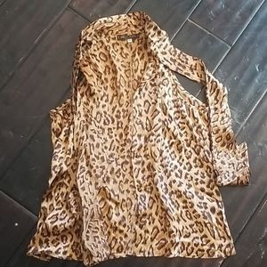 Angel nina sleeveless silk top with covered button